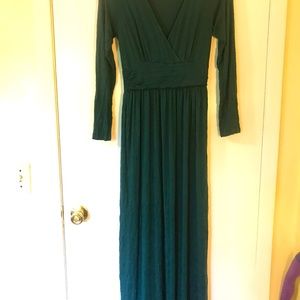 Deep emerald green long sleeved maxi dress with pockets